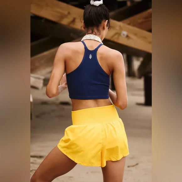 Free People Movement Carpe Diem Shorts in Yellow. - Picture 2 of 6